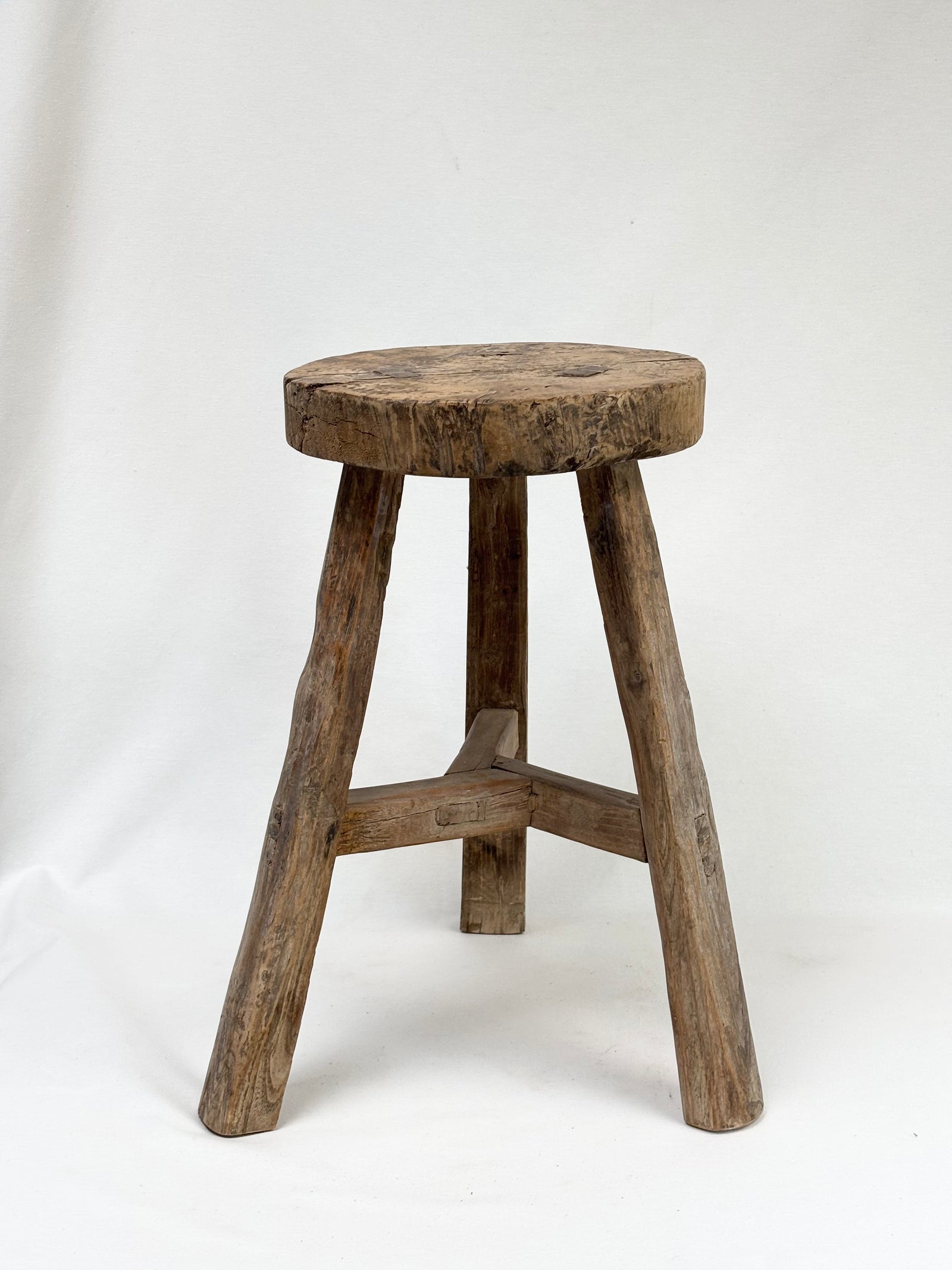 Antique round elm stool